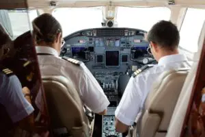 Two pilots inside the cockpit